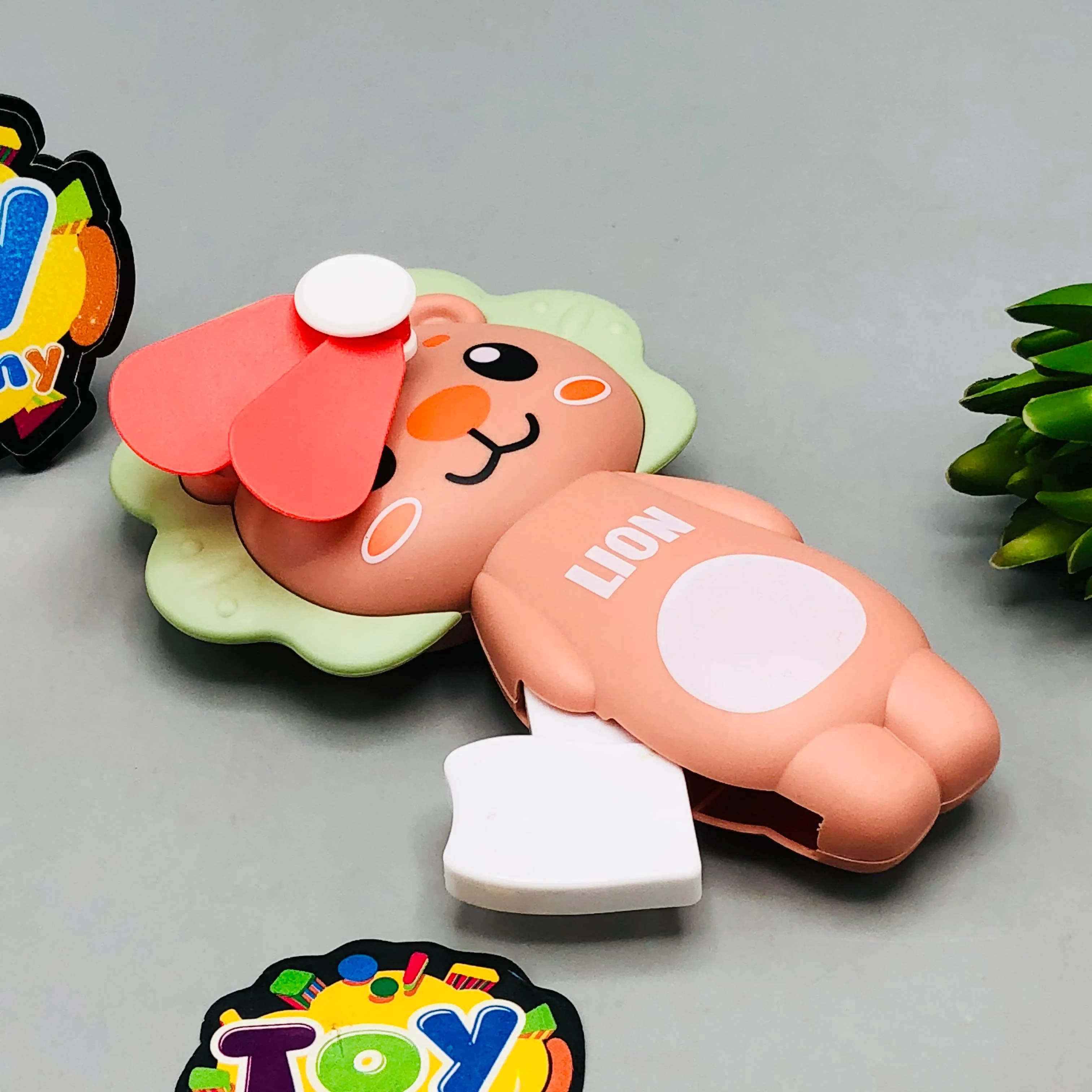 Kids Cute Mini Lion Hand Press Fan - 1Pc - Image 4
